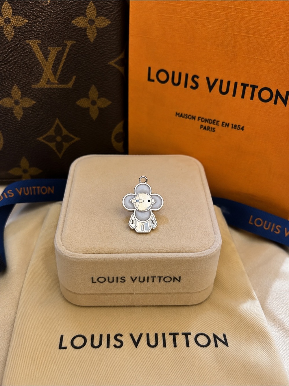 Louis Vuitton stamped Silver Vivienne Charm - Silver and White
